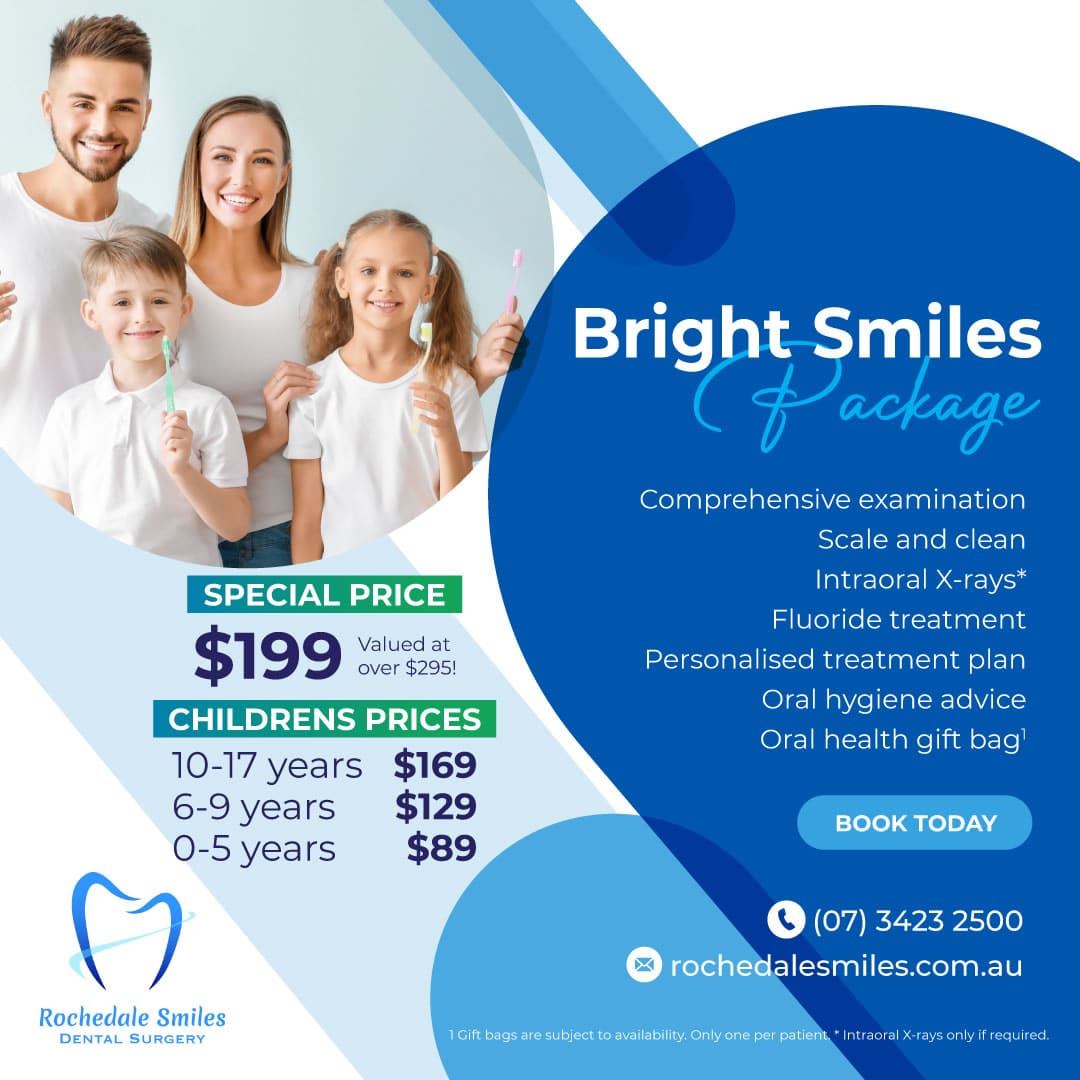 Dental hygienist cleaning patient’s teeth